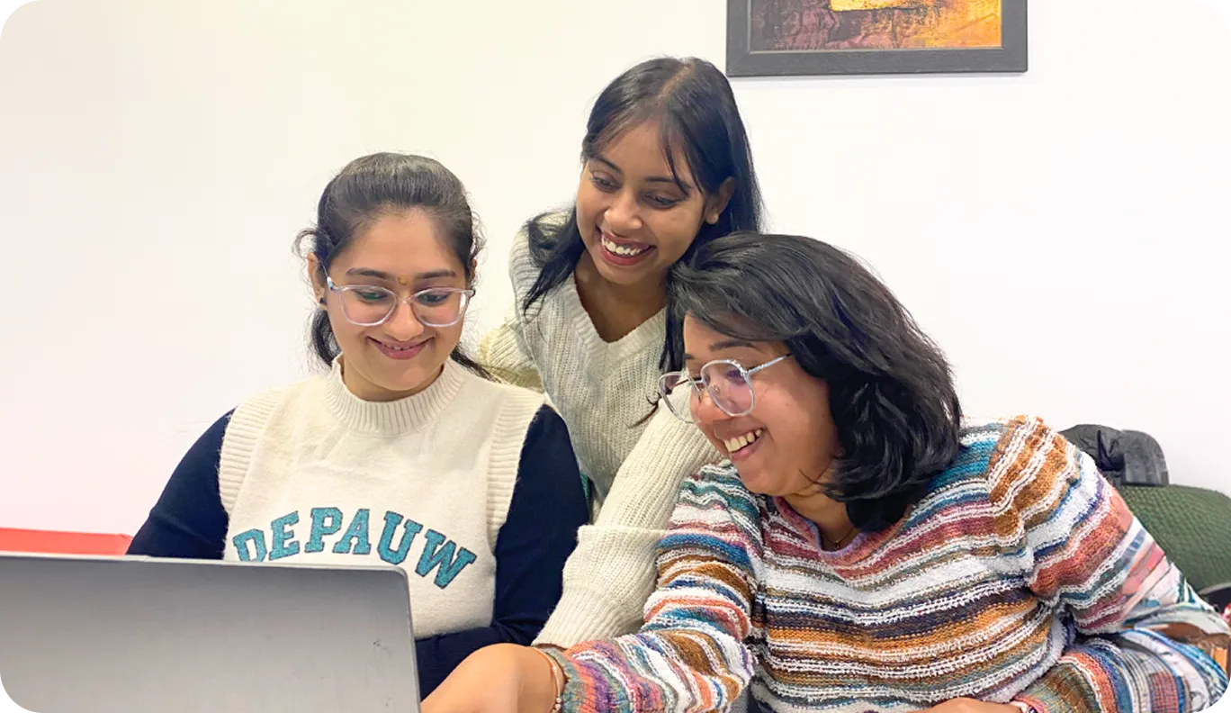 employees working on laptops 